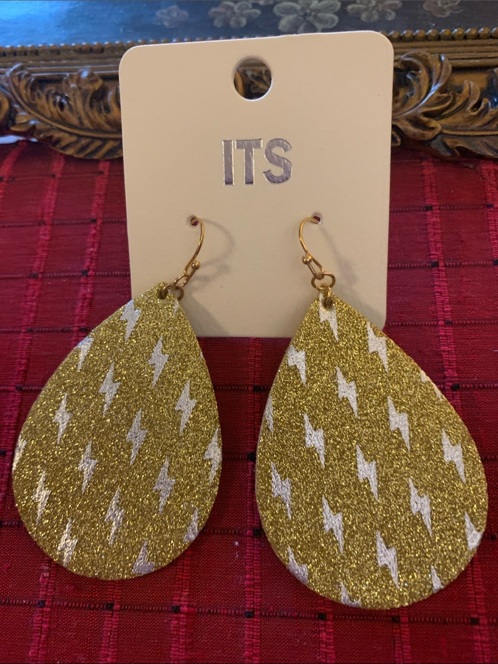 !it jeans Gold Glitter Teardrop Earrings with White Lightning Motif